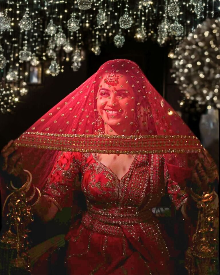 Indian bride smiling photo in lehenga